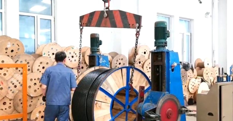 Finished cable drum being lifted and packed for dispatch