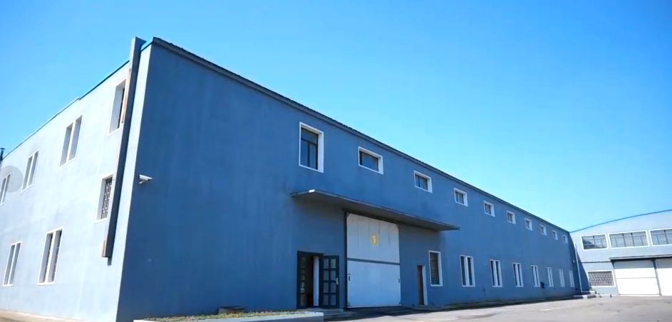 Exterior of a light industrial building housing the production lines